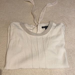 Banana republic cream sweater with silver around neckline. Size large.